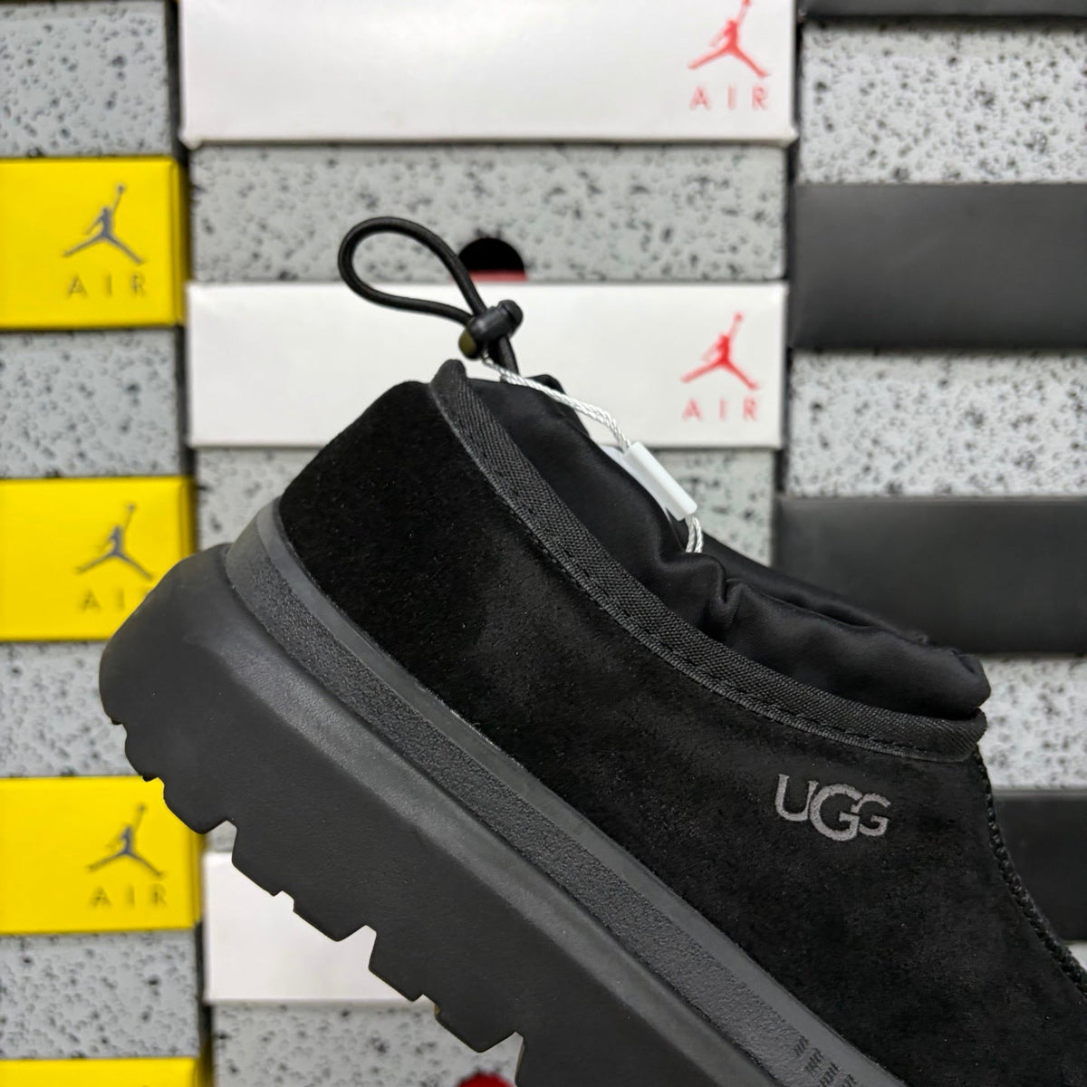 UGG Neumeel Deco Slip-On – Suede Moccasin Sneaker in All Black with Carabiner Collar & Black Lug Sole